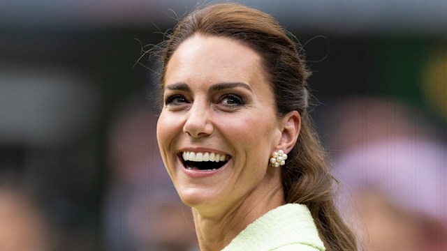 Catherine smiling over shoulder 