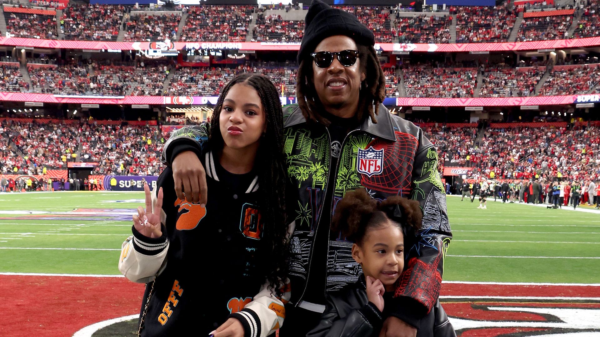 (L-R) Blue Ivy Carter, Jay-Z and Rumi Carter attend the Super Bowl LVIII Pregame at Allegiant Stadium on February 11, 2024 in Las Vegas, Nevada.