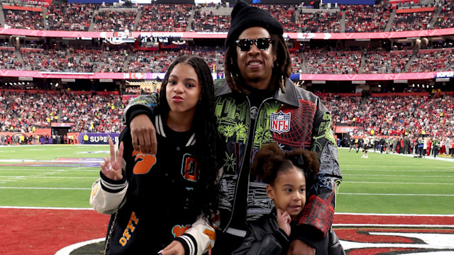 (L-R) Blue Ivy Carter, Jay-Z and Rumi Carter attend the Super Bowl LVIII Pregame at Allegiant Stadium on February 11, 2024 in Las Vegas, Nevada.