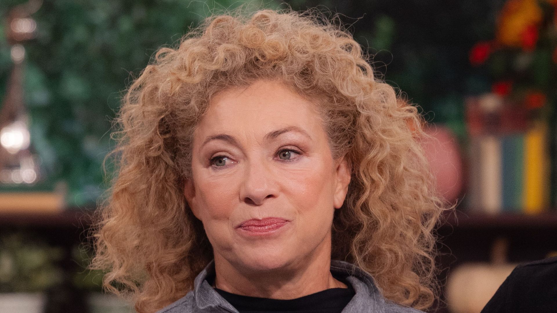 Alex Kingston on This Morning sofa in grey top