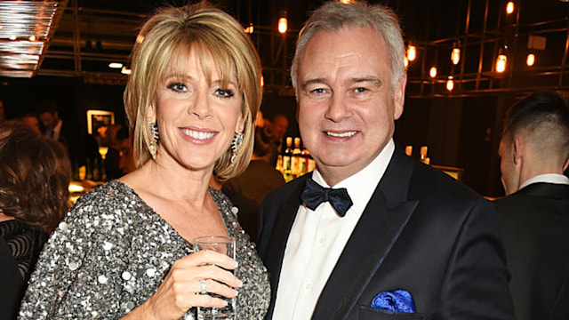 Ruth Langsford and Eamonn Holmes attend the 21st National Television Awards. He is wearing a tux and she is wearing silver beaded floor-length gown