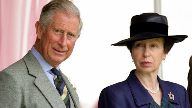 King Charles in a kilt next to Princess Anne in a blue coat