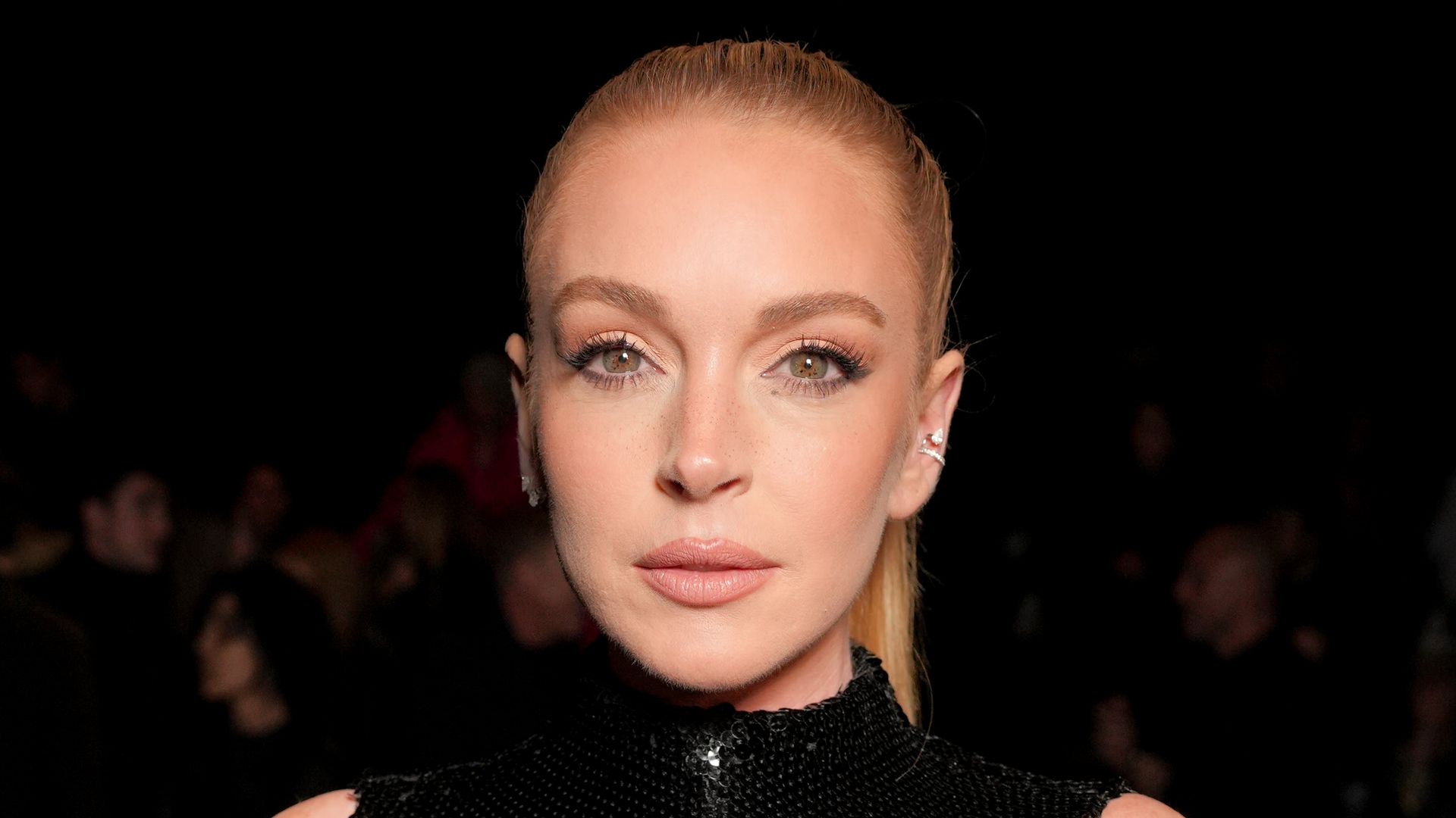 Fresh-faced Lindsay Lohan debuts major hair transformation at Paris Fashion Week