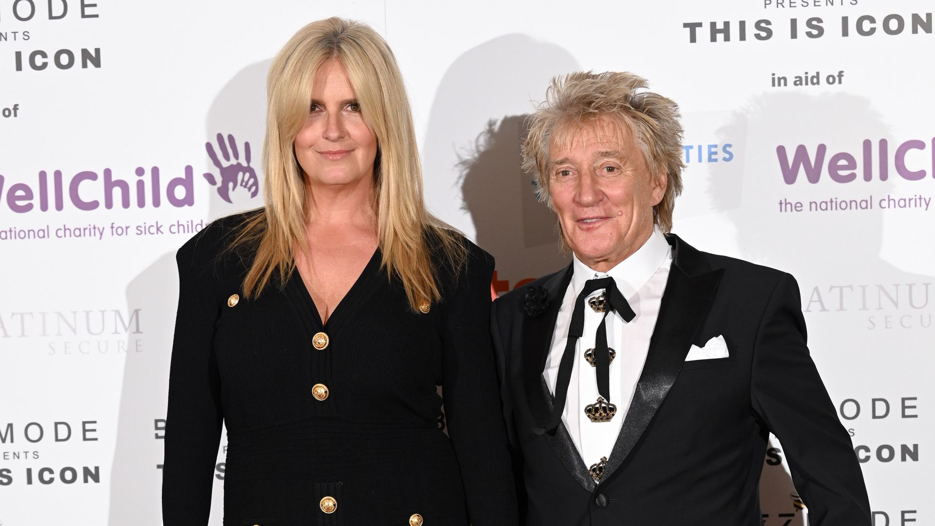 Penny Lancaster and Rod Stewart in black outfits