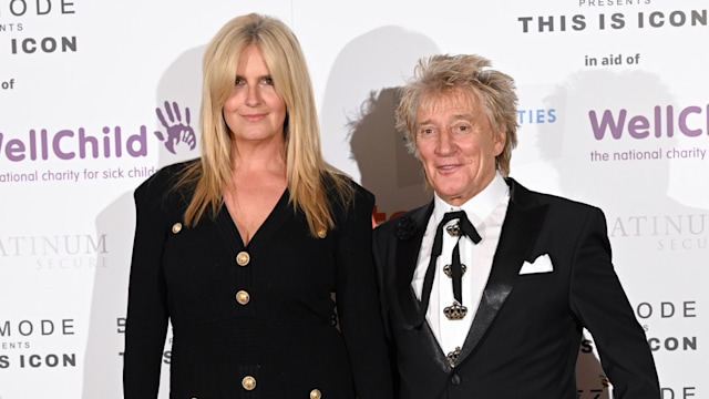 Penny Lancaster and Rod Stewart in black outfits