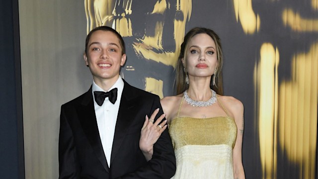 Angelina Jolie and her son Knox Jolie-Pitt arrive for the Academy of Motion Picture Arts and Sciences' 15th Annual Governors Awards at the Ray Dolby Ballroom in Los Angeles on November 17, 2024. (Photo by VALERIE MACON / AFP) (Photo by VALERIE MACON/AFP via Getty Images)