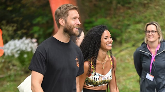 Calvin Harris and Vick Hope walking together