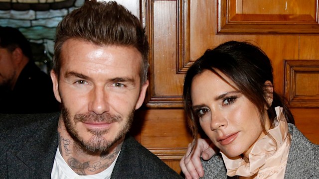 David Beckham and Victoria Beckham in the front row 