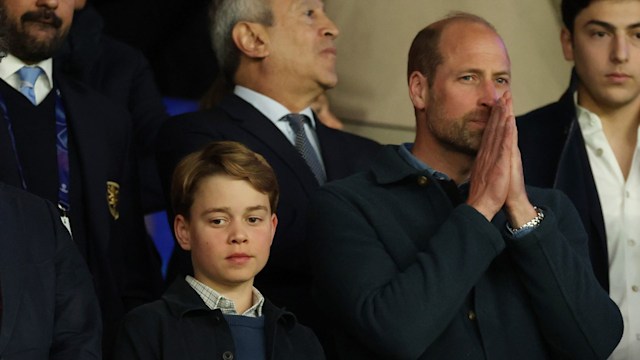 Prince George and Prince William watching football