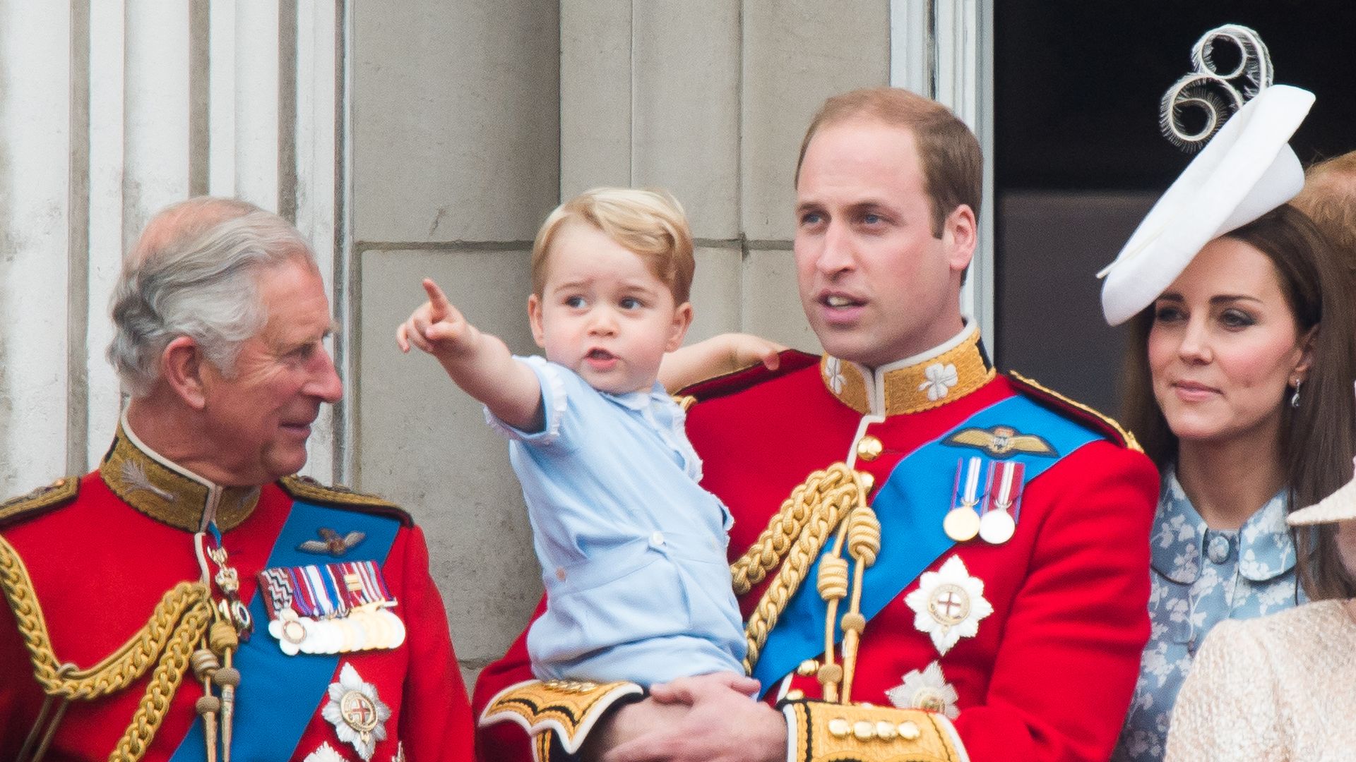 Prince George points on palace balcony at first Trooping the Colour