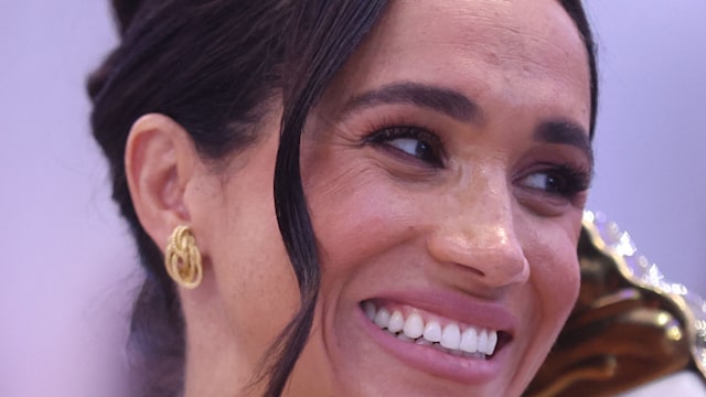 Meghan Markle Duchess of Sussex, looks on as she attends a Sit Out with Britain's Prince Harry Duke of Sussex, at the Nigerian Defence Headquarters in Abuja on May 11, 2024 as they visit Nigeria as part of celebrations of Invictus Games anniversary. 