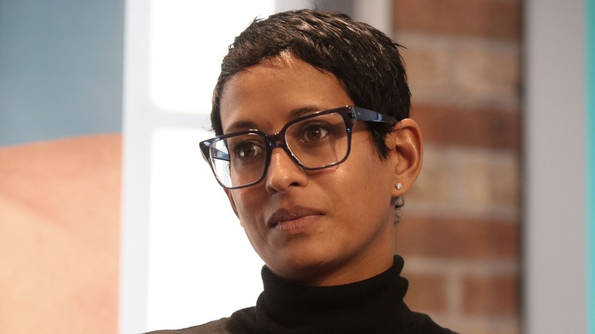 Naga Munchetty looks concerned as she attends a panel discussion