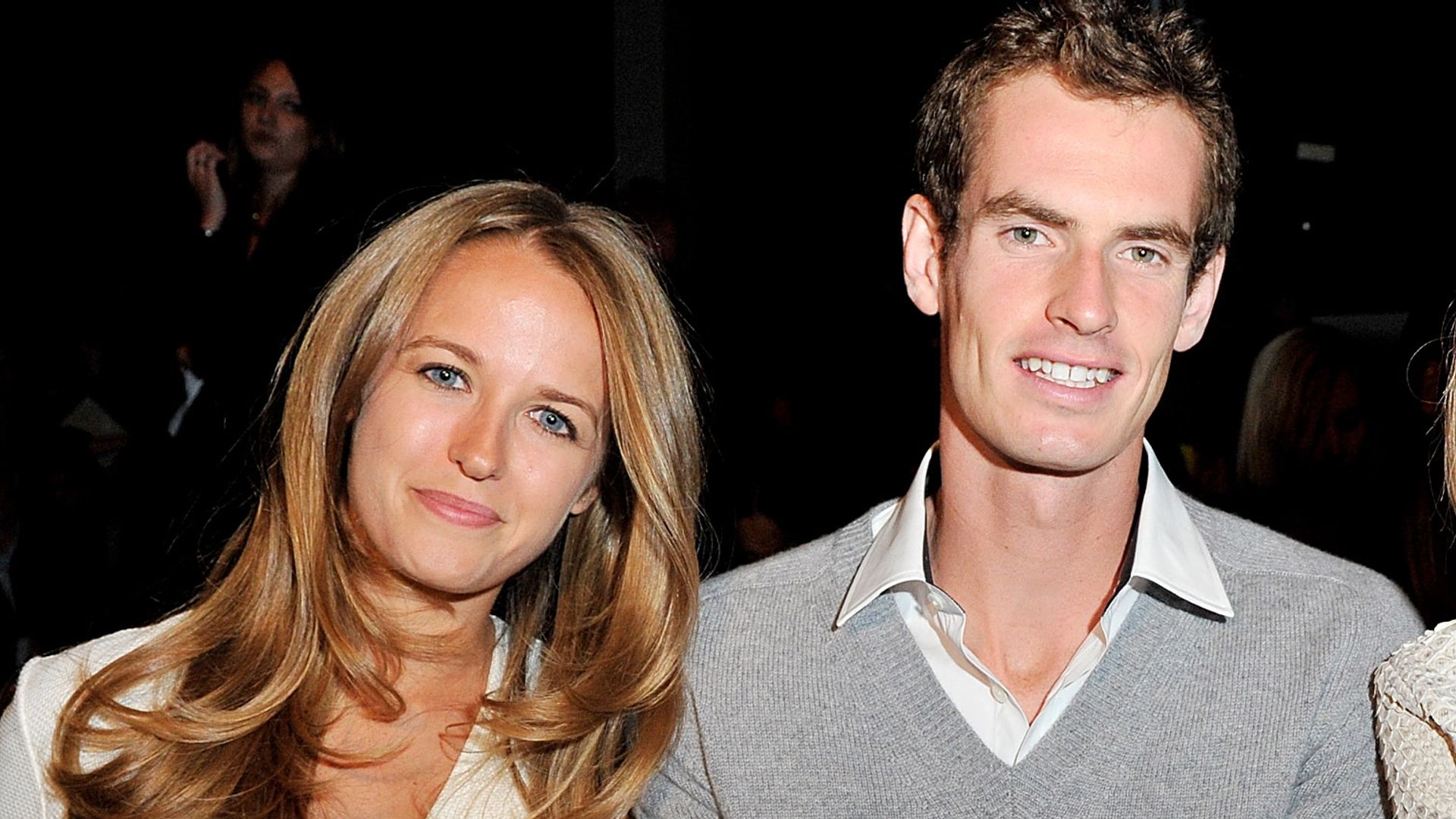 Kim in a white dress with Andy Murray in a grey jumper