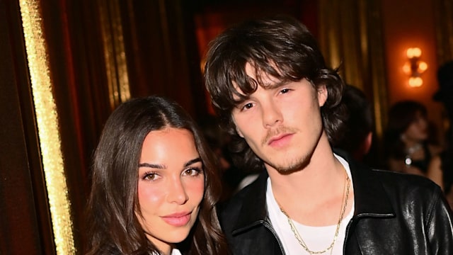 couple posing at after party 