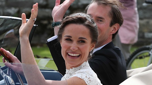 Pippa Middleton and James Matthews waving in the car following their wedding