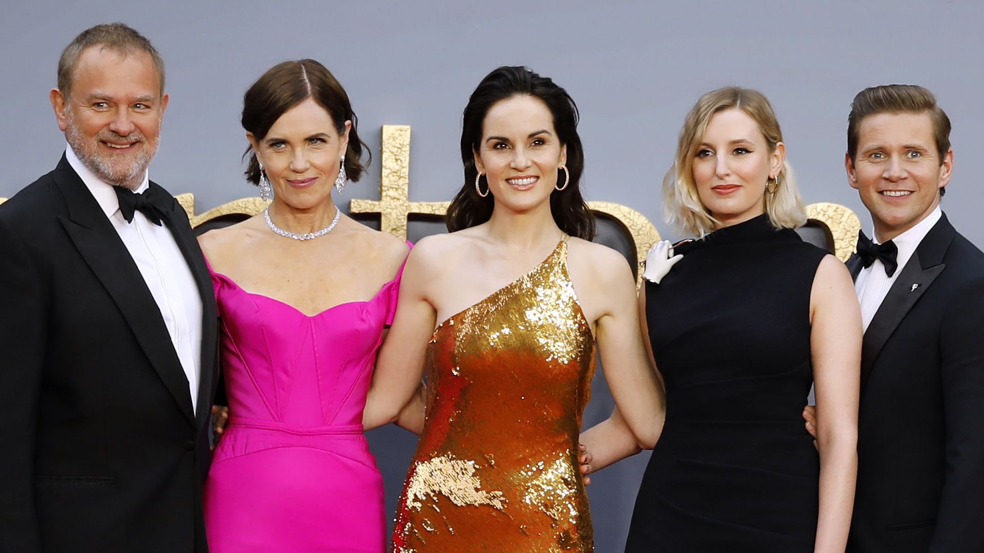 Hugh Bonneville, Elizabeth McGovern, Michelle Dockery, Laura Carmichael and Allen Leech pose on the red carpet upon arrival for the world premiere of the film "Downton Abbey" in London on Spetember 9, 2019.