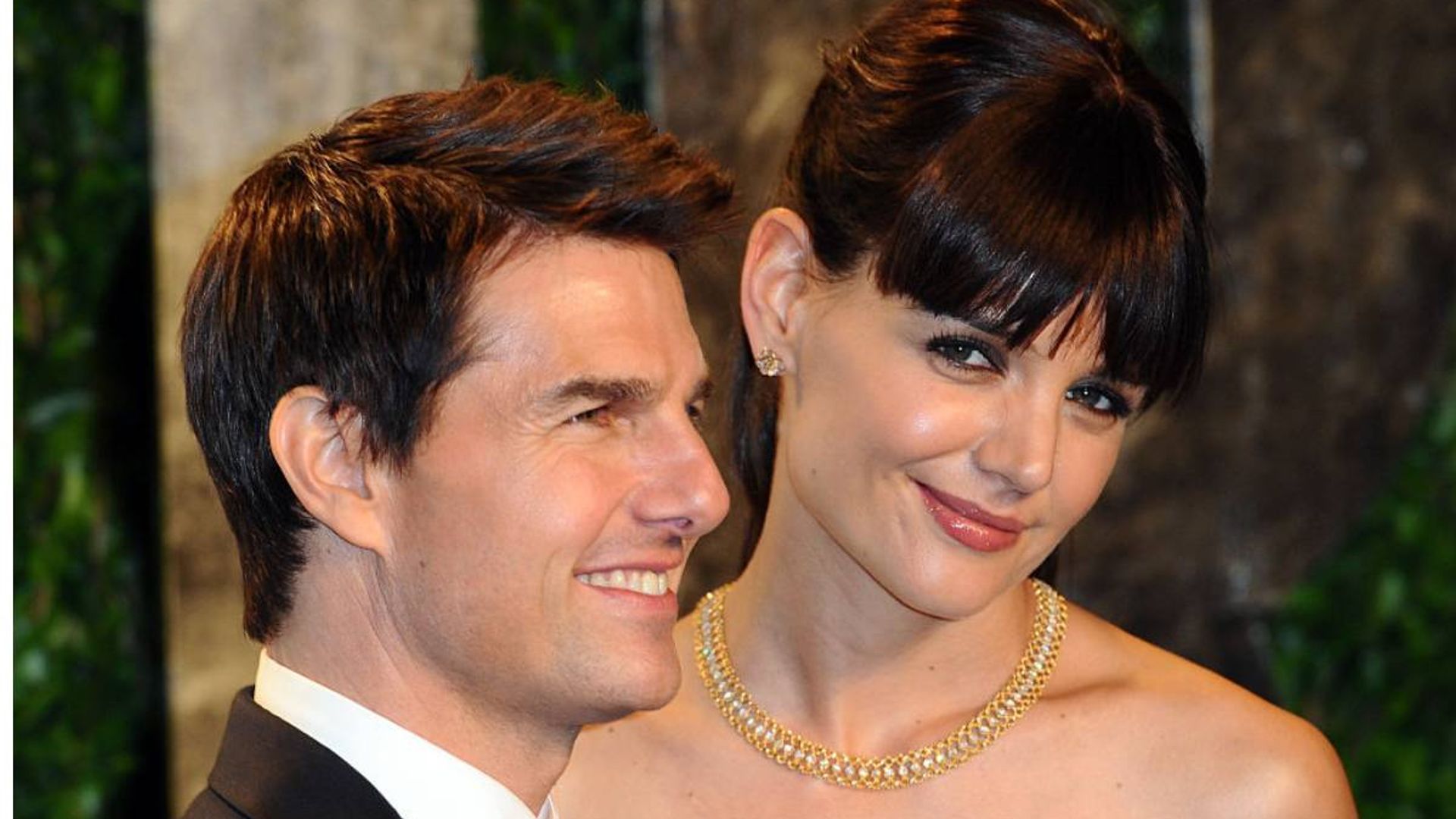 Katie Holmes and Tom Cruise posing during happier times in marriage 
