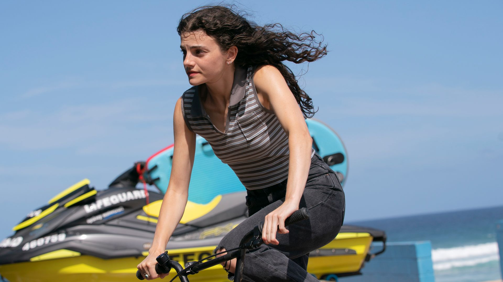 teenage girl riding bike