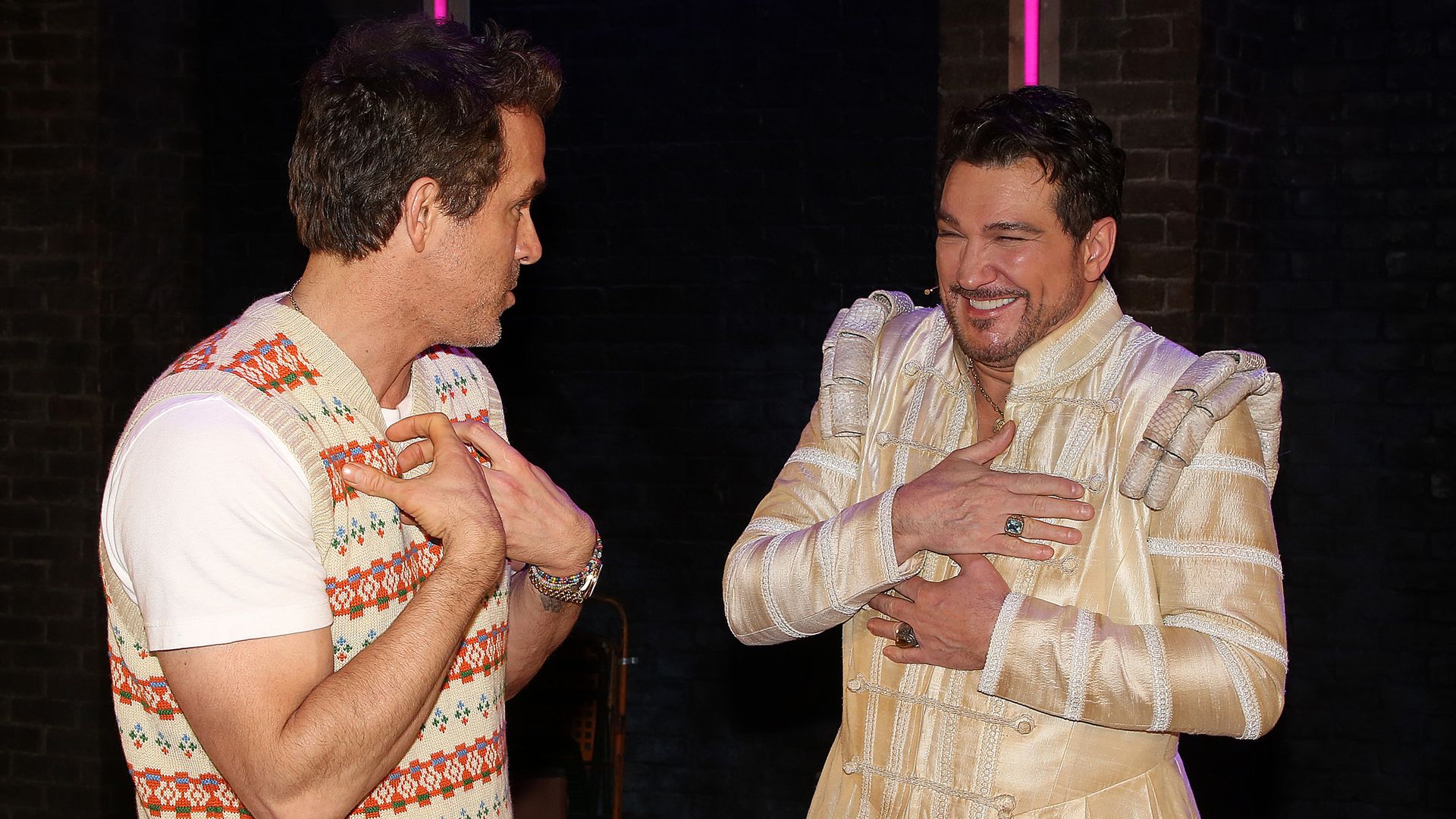 Ryan Reynolds and Paulo Szot backstage at the hit Max Martin Musical "& Juliet" on Broadway at The Stephen Sondheim Theatre on October 23, 2024 in New York City. Blake Lively surprised Ryan Reyonalds on his 43rd Birthday with tickets to the hit Broadway Musical "& Juliet" and brought all 3 kids (not pictured) The cast sang "Happy Birthday" to Ryan and they posed for photos with the cast & crew