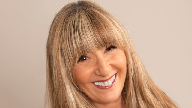 Headshot of woman with long hair