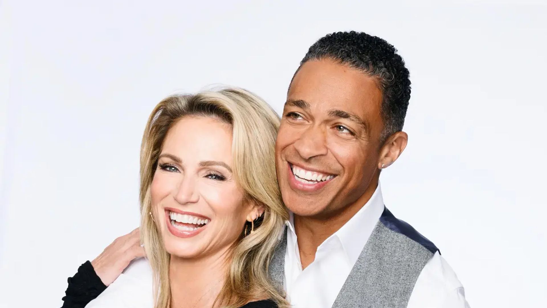 TJ Holmes and Amy Robach celebrate big news with mid-day champagne at romantic lunch