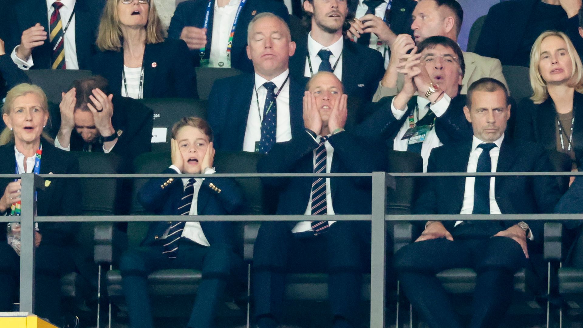 prince george and prince william watching football 