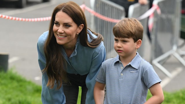 Kate and Louis standing together