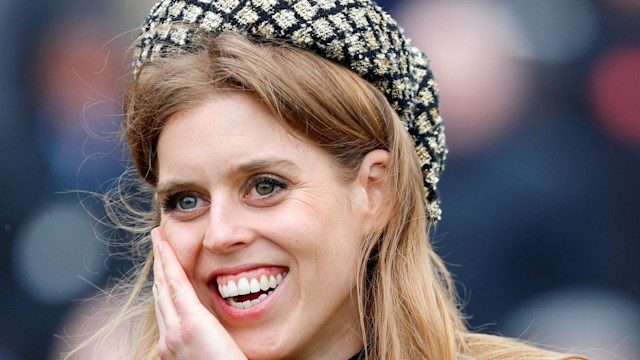 Princess Beatrice watches the racing as she attends day 3 'St Patrick's Thursday' of the Cheltenham Festival at Cheltenham Racecourse on March 14, 2024 in Cheltenham, England