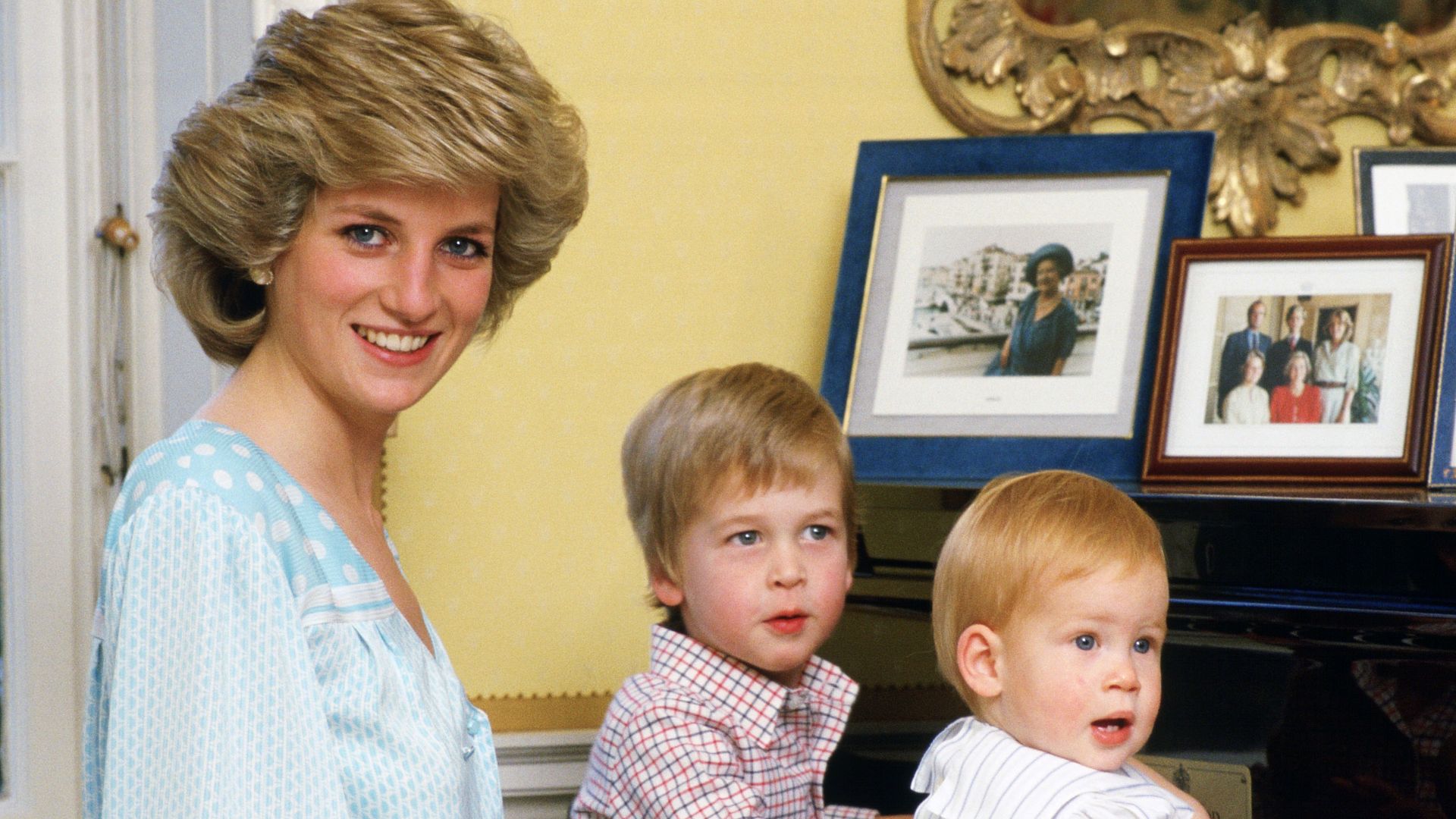 Diana, Princess of Wales with her sons, Prince William and Prince Harry at piano