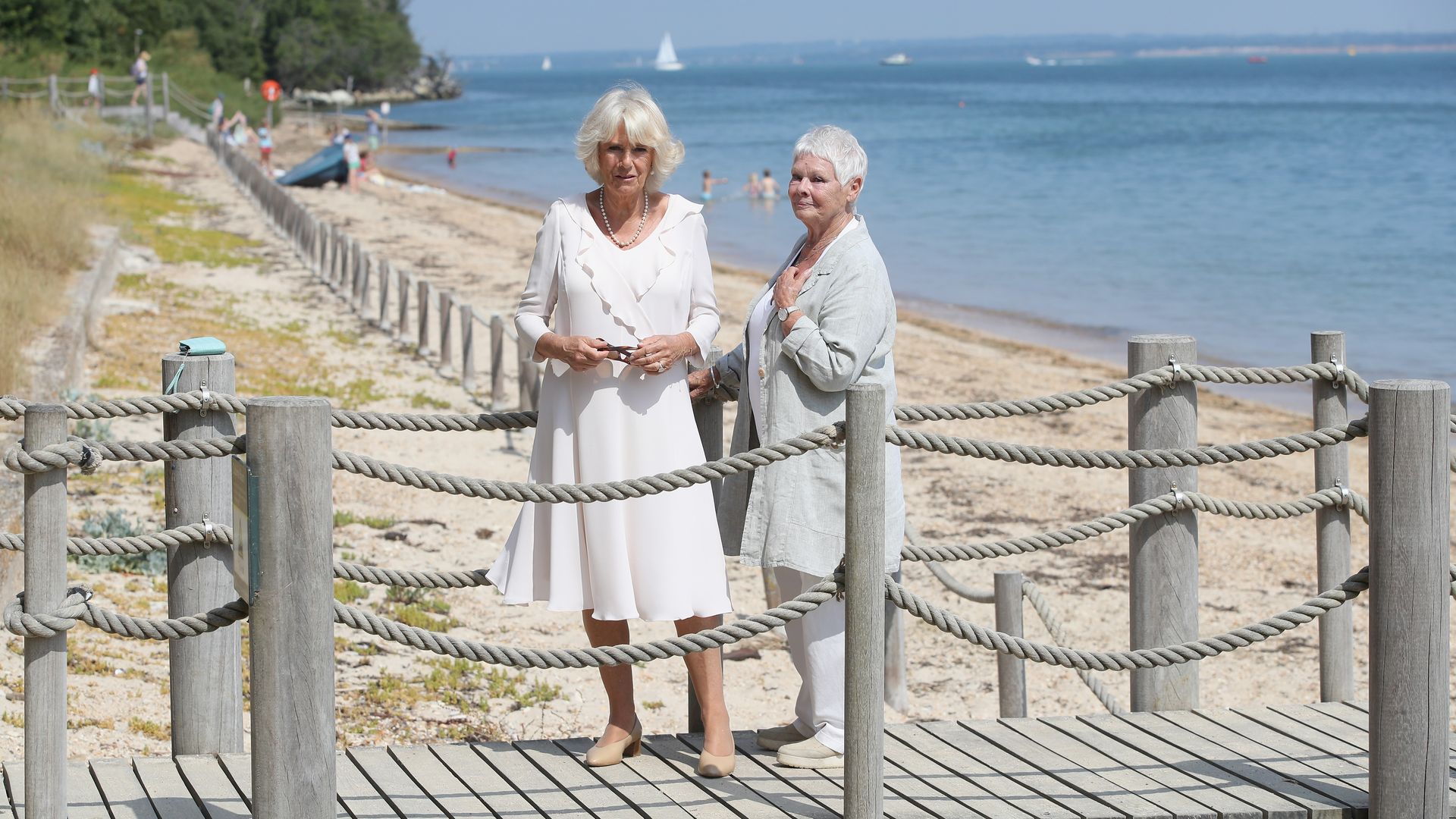 camilla and judi dench on beach