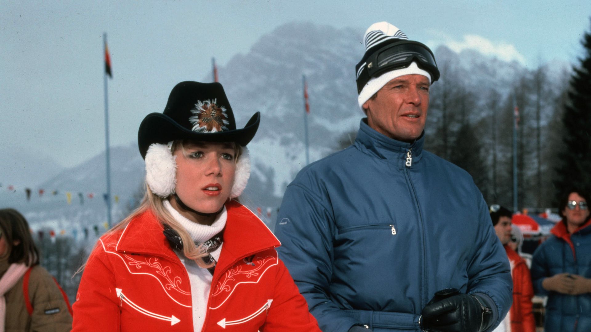 Still image of Lynn-Holly Johnson and Roger Moore in skiwear in For Your Eyes Only