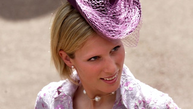 Zara Tindall in a purple hat and embroidered lilac top