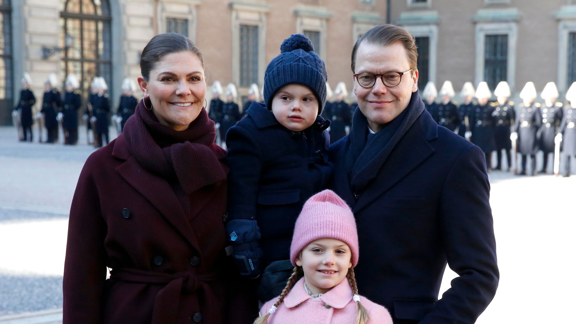 Swedish royal family standing outside 