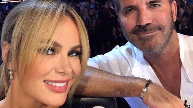 Amanda Holden and Simon Cowell posing for a selfie