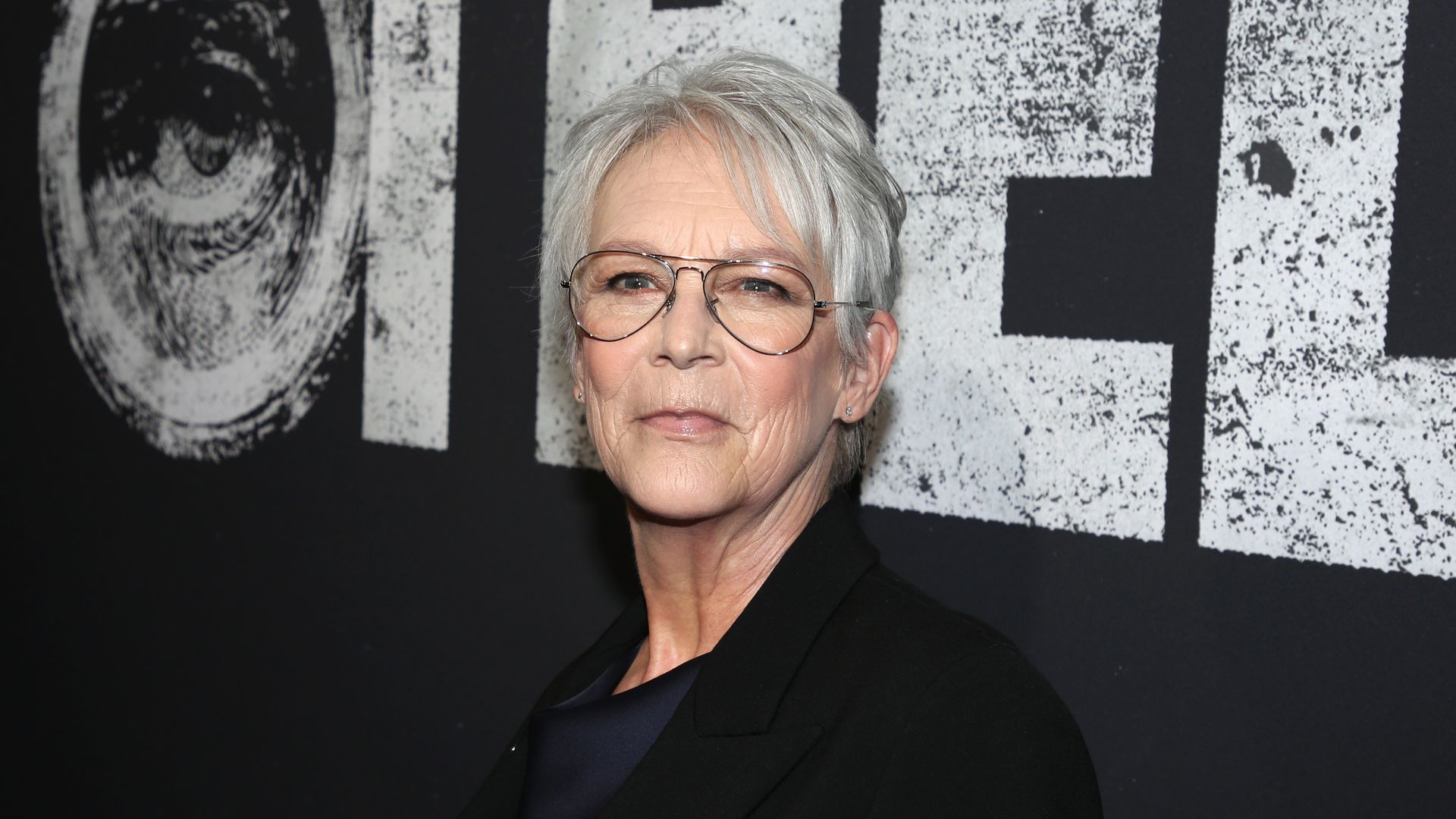 jamie lee curtis wearing glasses and black jacket at othello