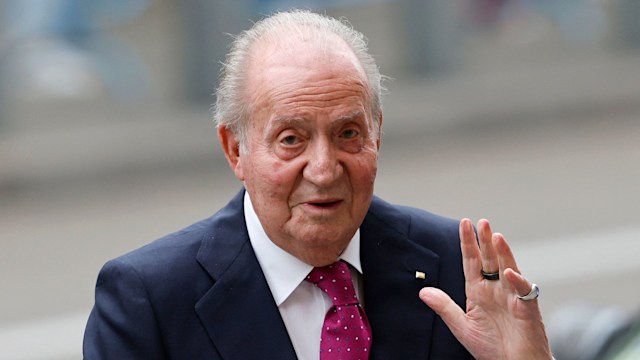 King Juan Carlos waving