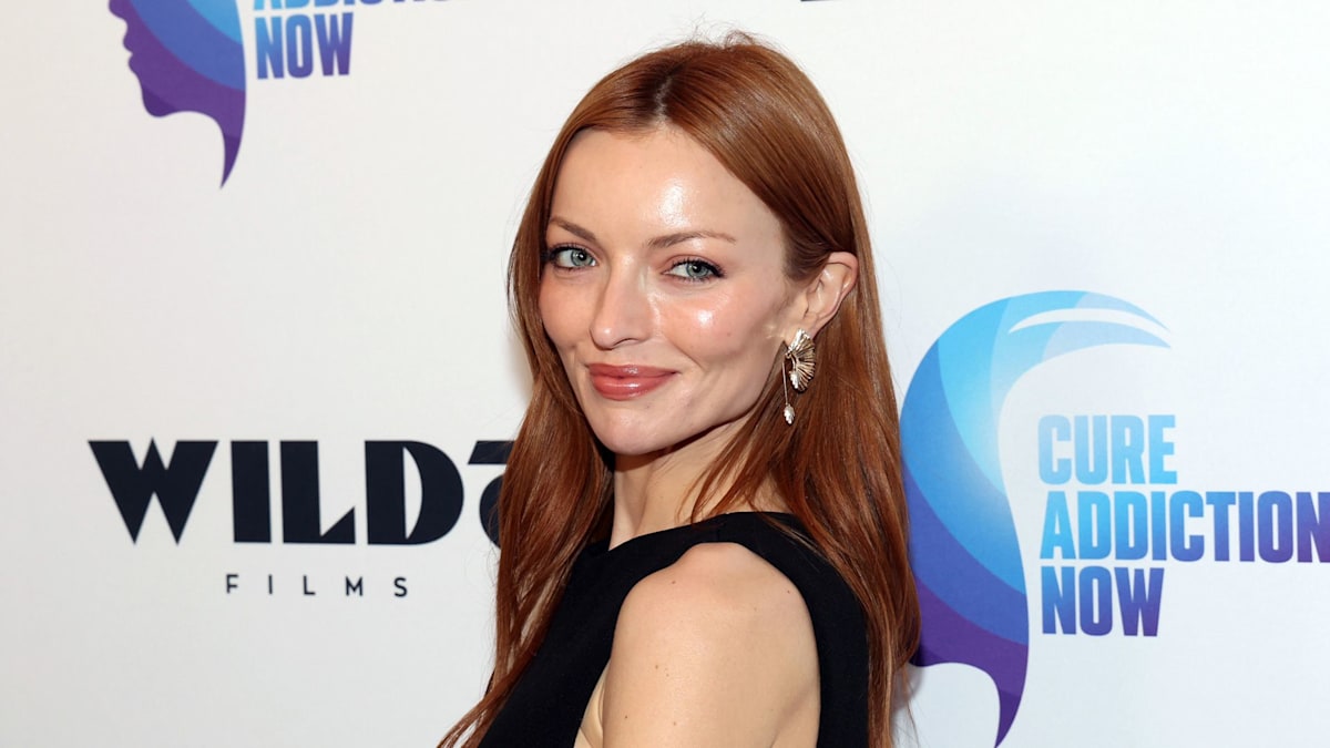 Clint Eastwood's pregnant daughter makes glamorous red carpet appearance with son