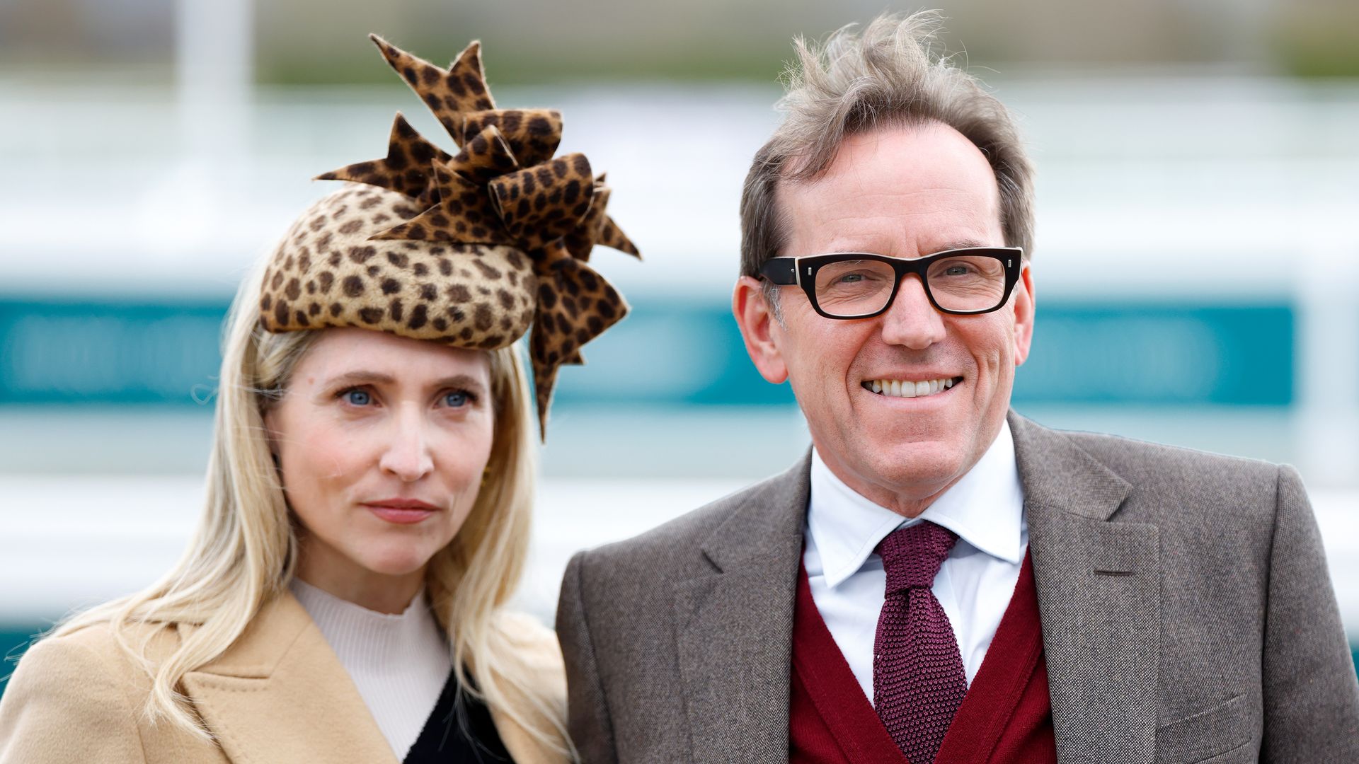 Ben Miller with his wife Jessica as they smile for photographers at Cheltenham Festival