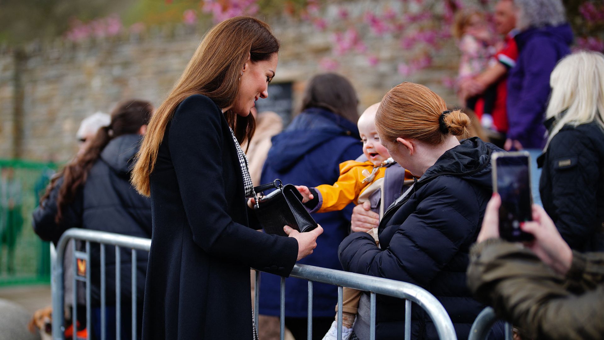 Video captures moment Kate Middleton lets baby play with her $845 handbag