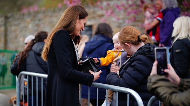 The Princess of Wales reacts to baby Daniel grabbing her handbag