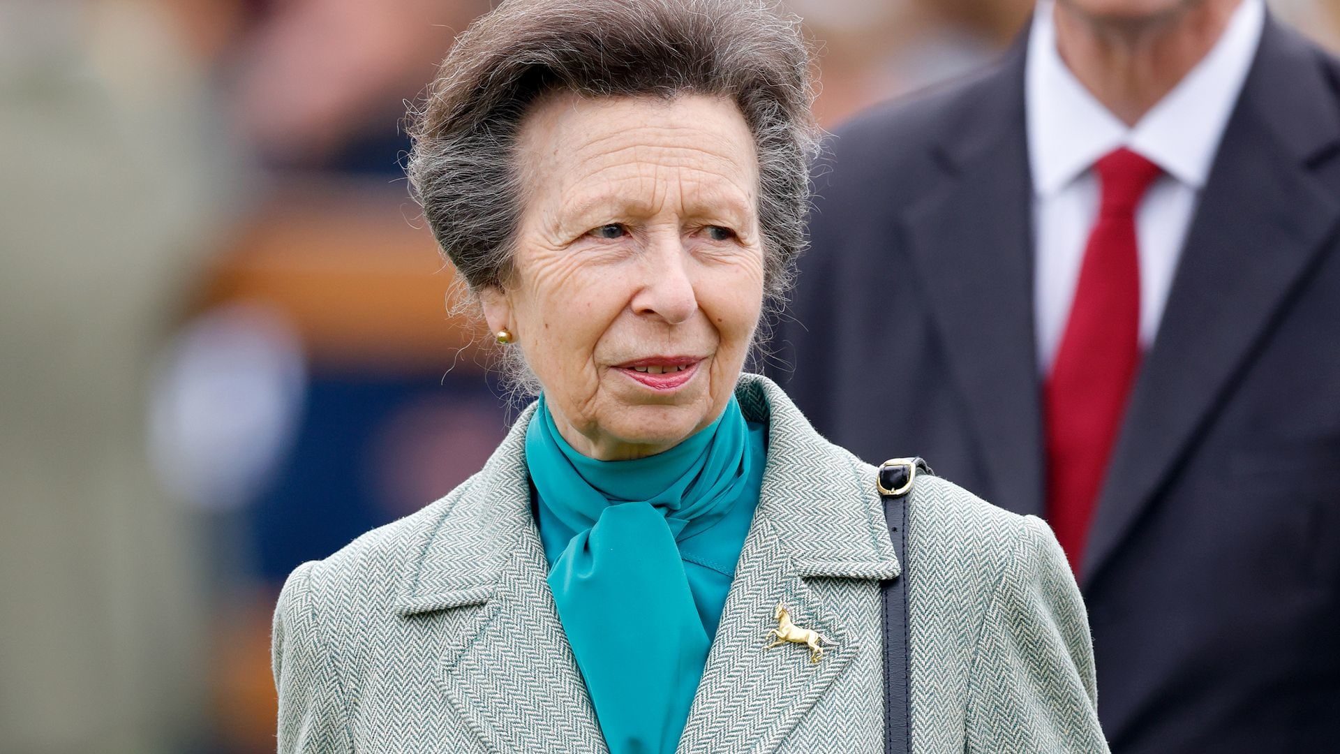 princess anne in green suit 