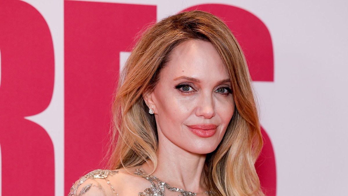 Angelina Jolie steps out in daring 'naked' dress at Paris premiere