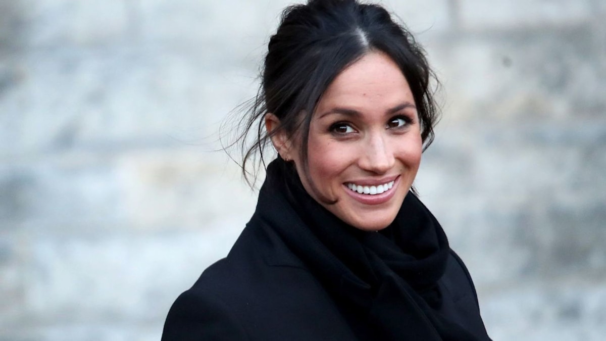 Meghan Markle Wears Long Camel Coat and Colorful Scarf On Outing