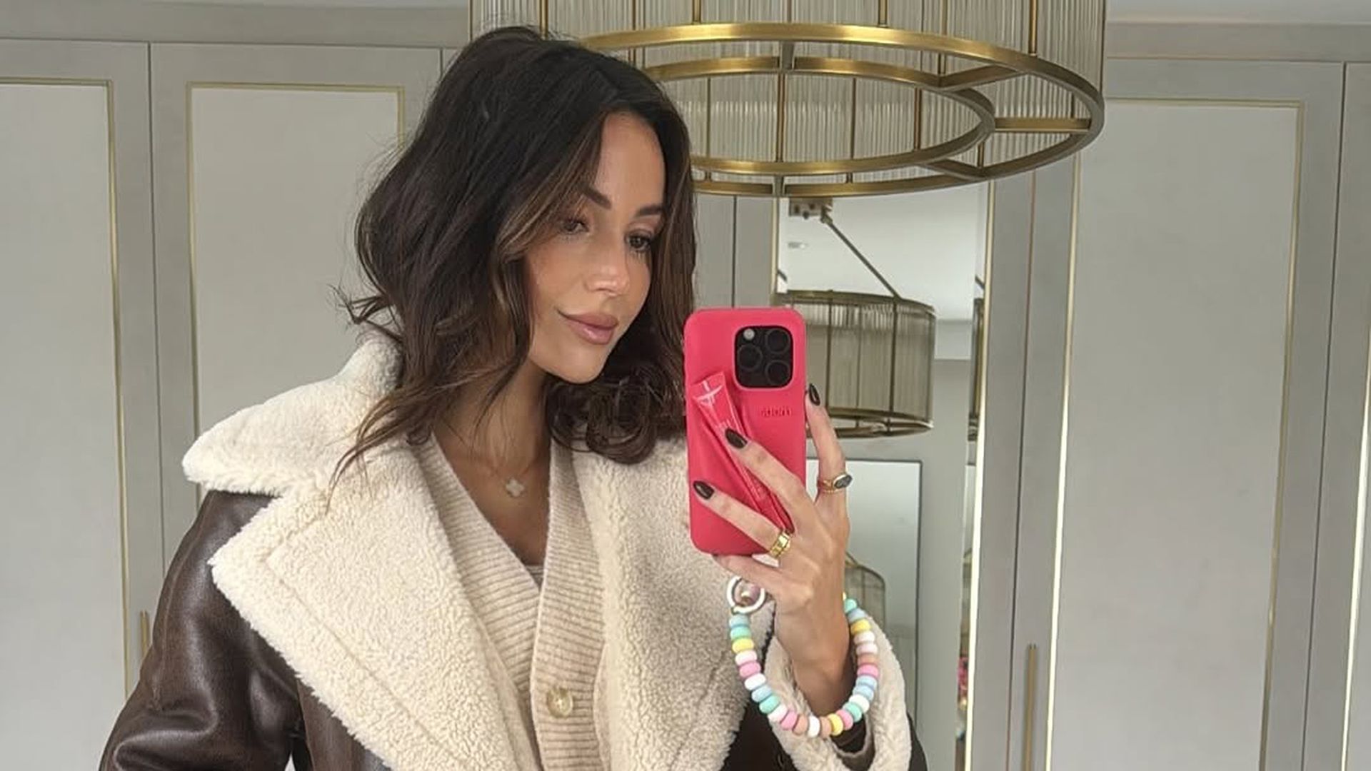 Michelle Keegan posing in her Essex home