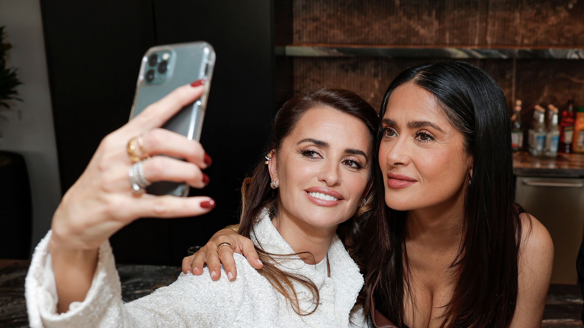 Penelope Cruz and Salma Hayek pose for a selfie. 
