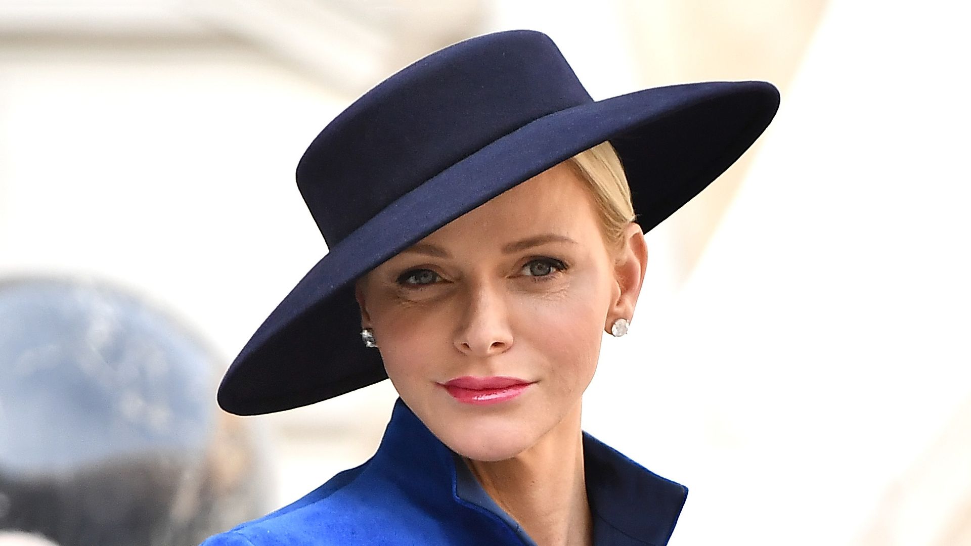 Princess Charlene in blue velvet coat and hat