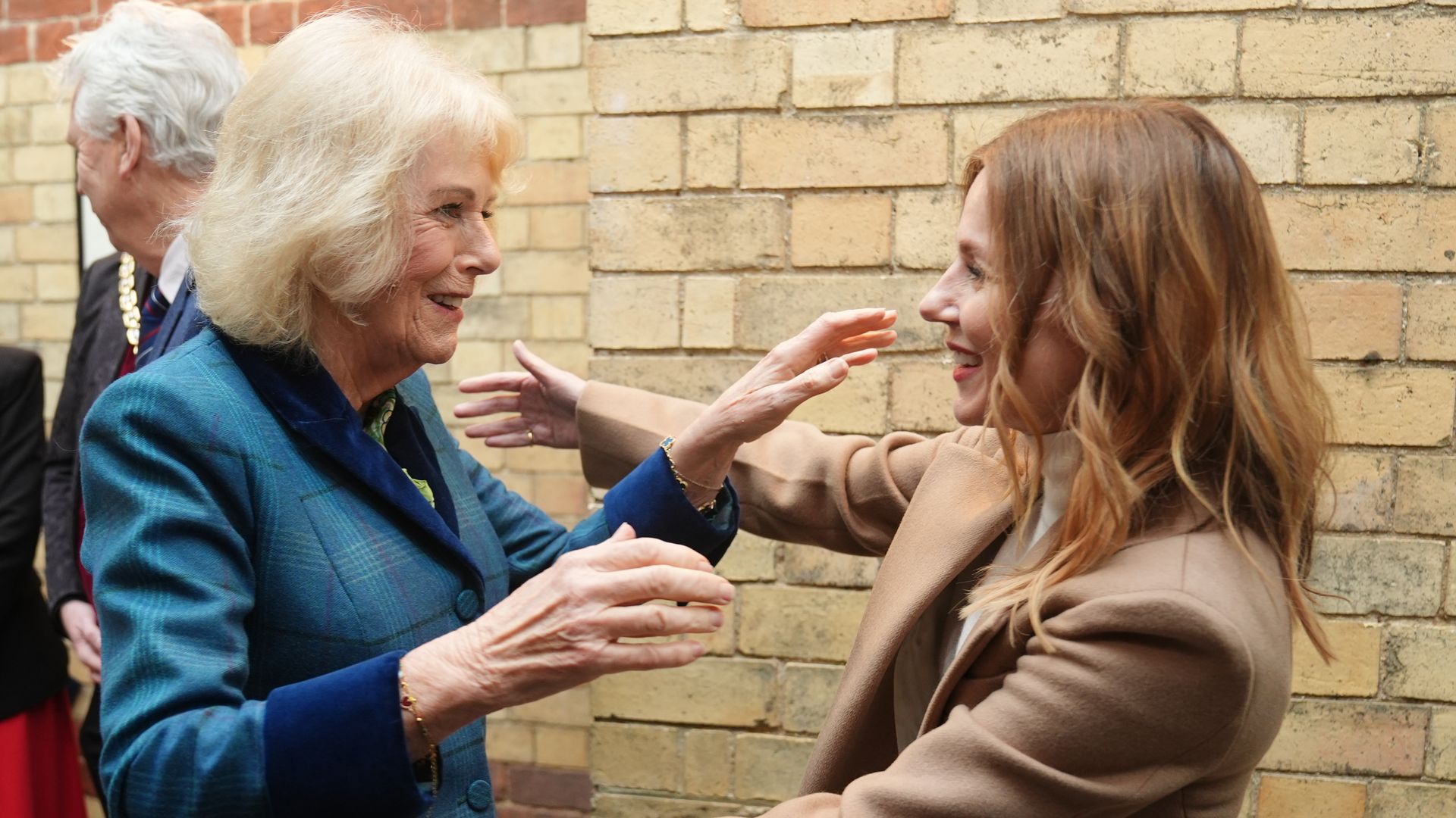 There was a warm exchange between the Queen and Geri
