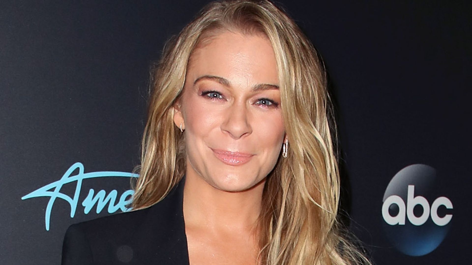LeAnn Rimes stuns in sheer Christmas gown after pleading with fans to ...