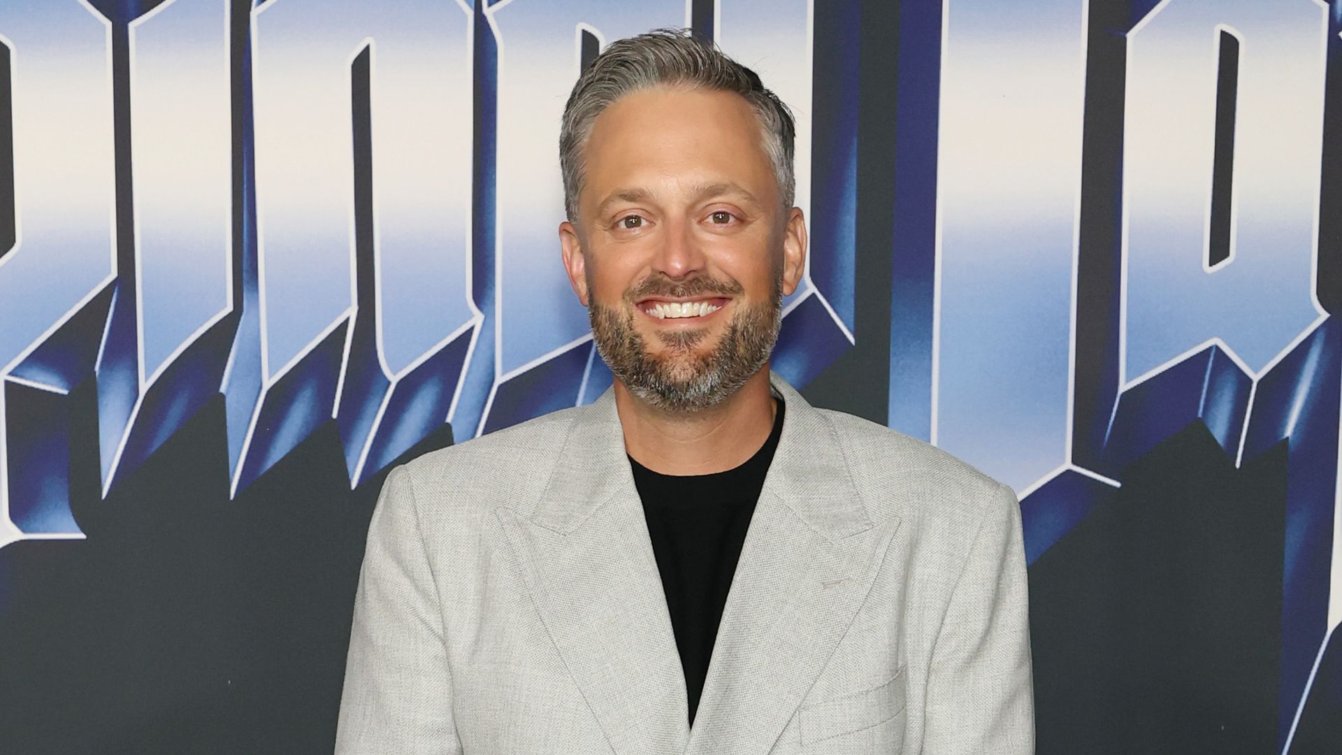 Nate Bargatze in gray blazer at he Egyptian Theatre Hollywood