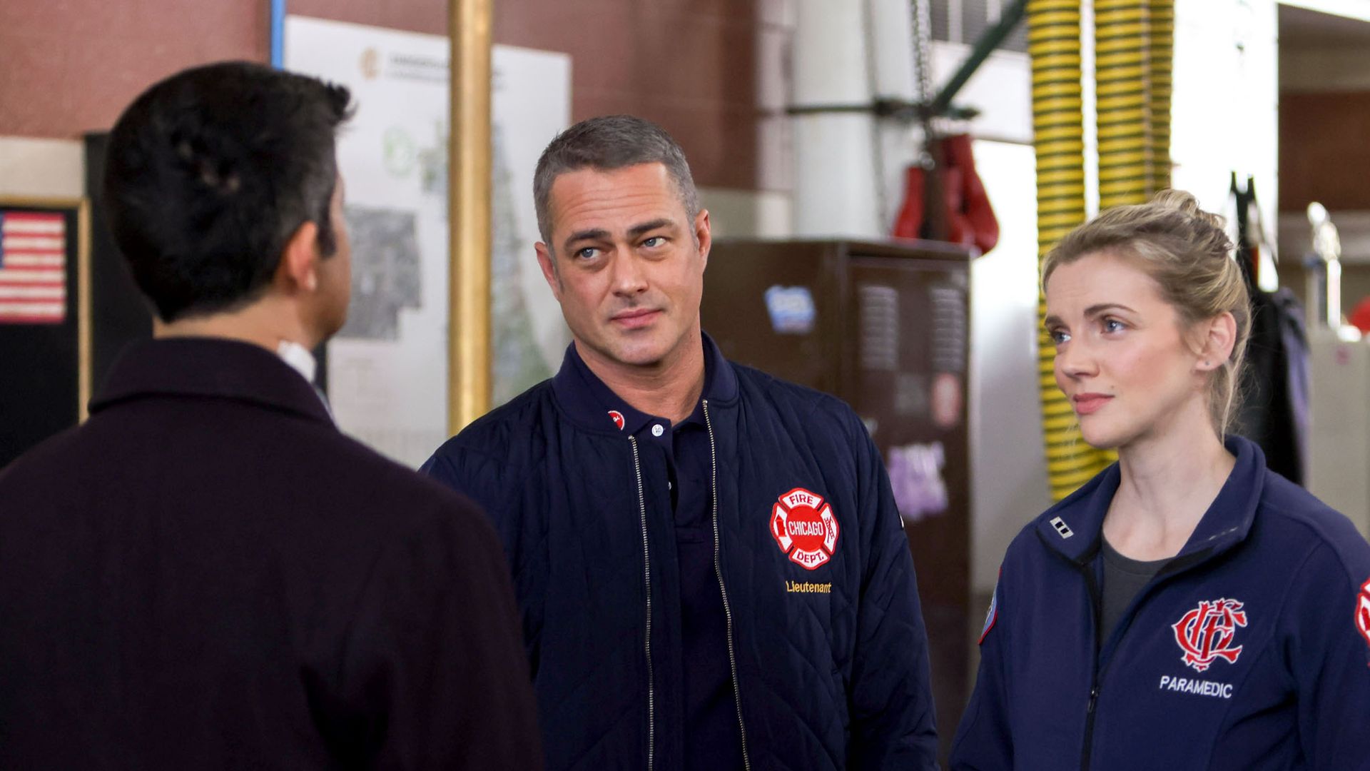 Assaf Cohen as Alexander, Taylor Kinney as Kelly Severide, Kara Killmer as Sylvie Brett on Chicago Fire season 11, 2022